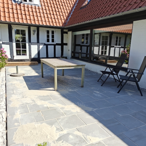 Belægning af terrasse med fliser