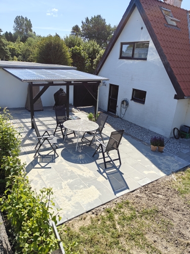 Flisebelagt terrasse i have
