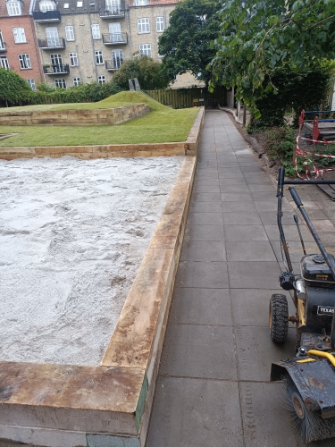 Anlægsentreprise af belægning